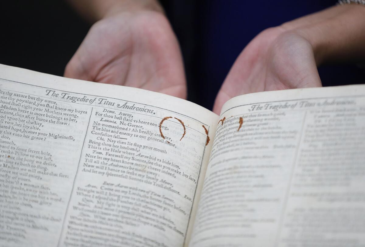 Rust from an old pair of scissors marks two pages of Shakespeare's First Folio.