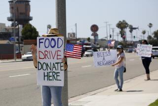 Members of Calvary Chapel of the Harbor have been holding a food drive for about two months on the 16400 block of Pacific Coast Highway, in Huntington Beach on Friday, May 22, 2020. According to Pastor Chad harris, they are collecting non-perishables and this food drive has allowed them to donate food to people at Leisure World, to veterans and families in need. "We are reaching out to those who can't get out," Harris said. They are at the location Fridays, Saturday and Sundays during the day.