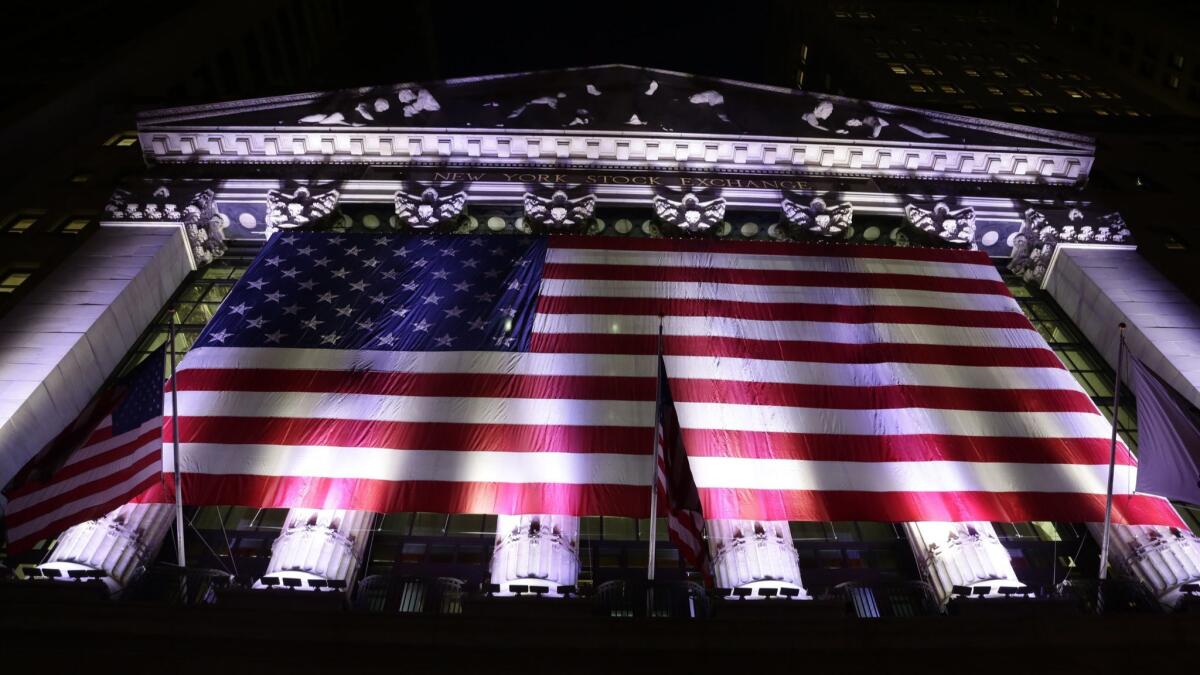 An American flag hangs on the front of the New York Stock Exchange in 2017.