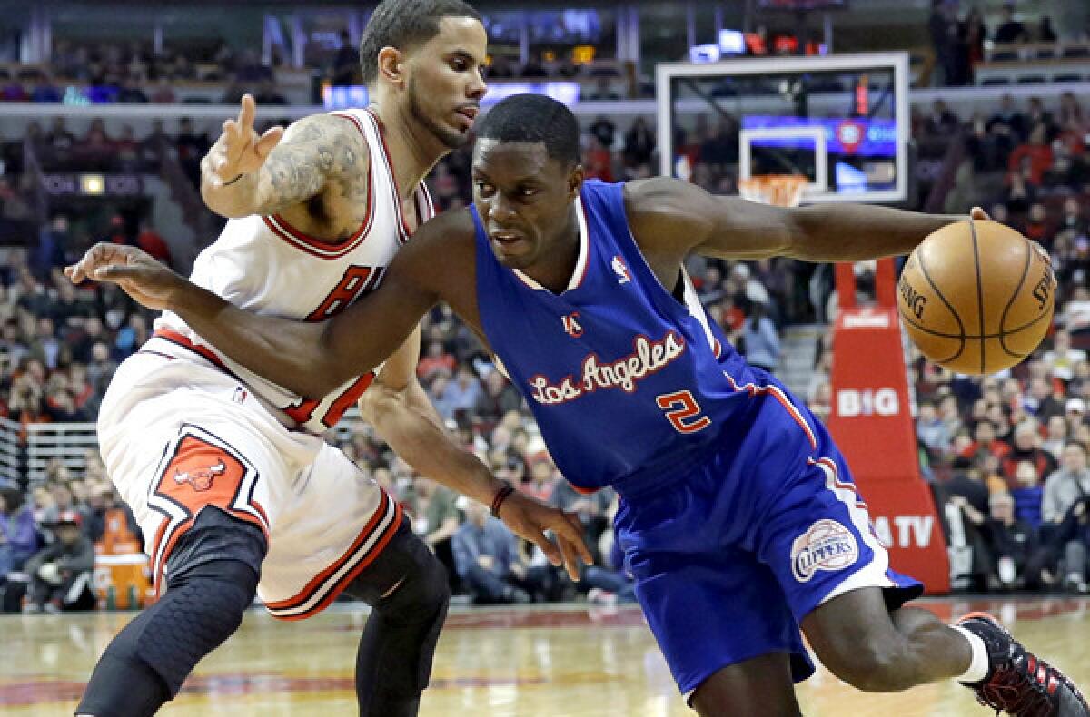 Clippers point guard Darren Collison (2) drives against Bulls guard D.J. Augustin during the a game last month in Chicago.