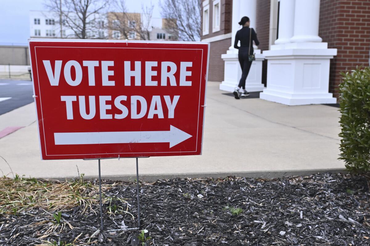 A voter heads into the Central Methodist Church in Fayetteville, Ark., to cast their ballot Tuesday.