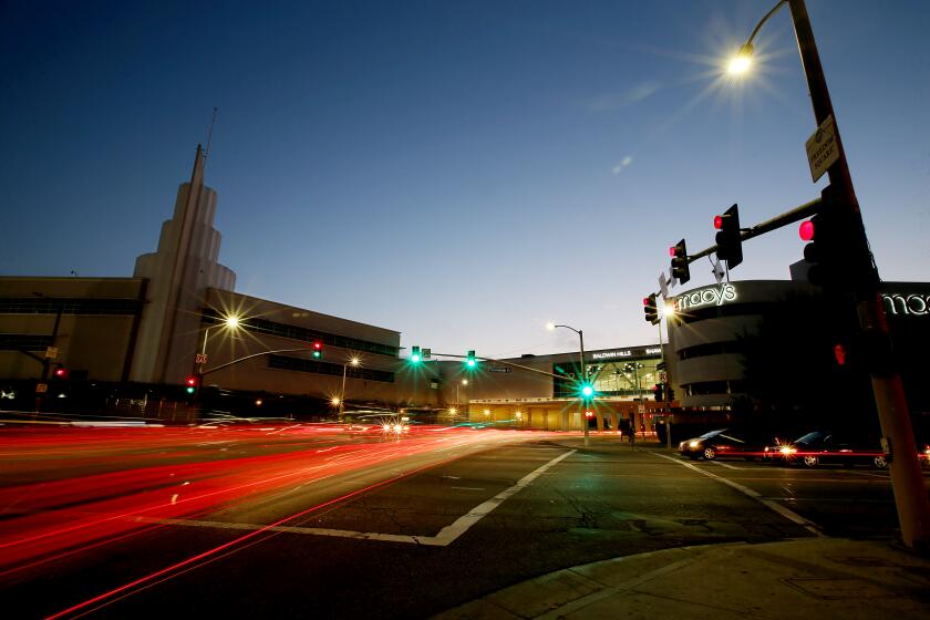 LOS ANGELES, CALIF. - JULY 12, 2017. The Baldwin Hills Crenshaw Plaza mall in Los Angeles as seen from the intersection of Crenshaw and Martin Luther King Jr. boulevards on Wednesday night, July 12, 2017. (Luis Sinco/Los Angeles Times)
