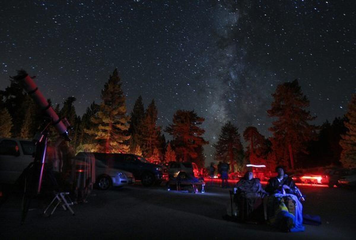 Sky watchers gather for the Perseid meteor shower of August 2010. This weekend, the Eta Aquarid meteor shower is at its peak.