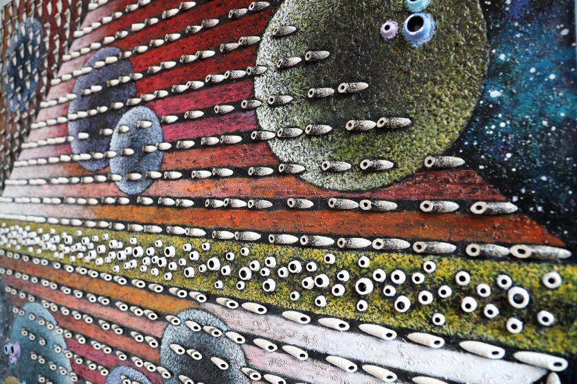 A close look at Koojah Kim's piece titled "Music of the Spheres" reveals its texture.