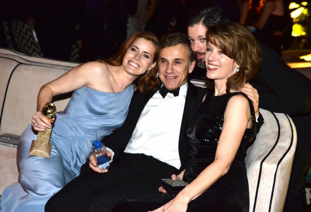 Those in attendance at a 2015 Golden Globes after-party hosted by Weinstein Co. and Netflix included, from left, Amy Adams, Christoph Waltz, Darren Le Gallo and Judith Holste.