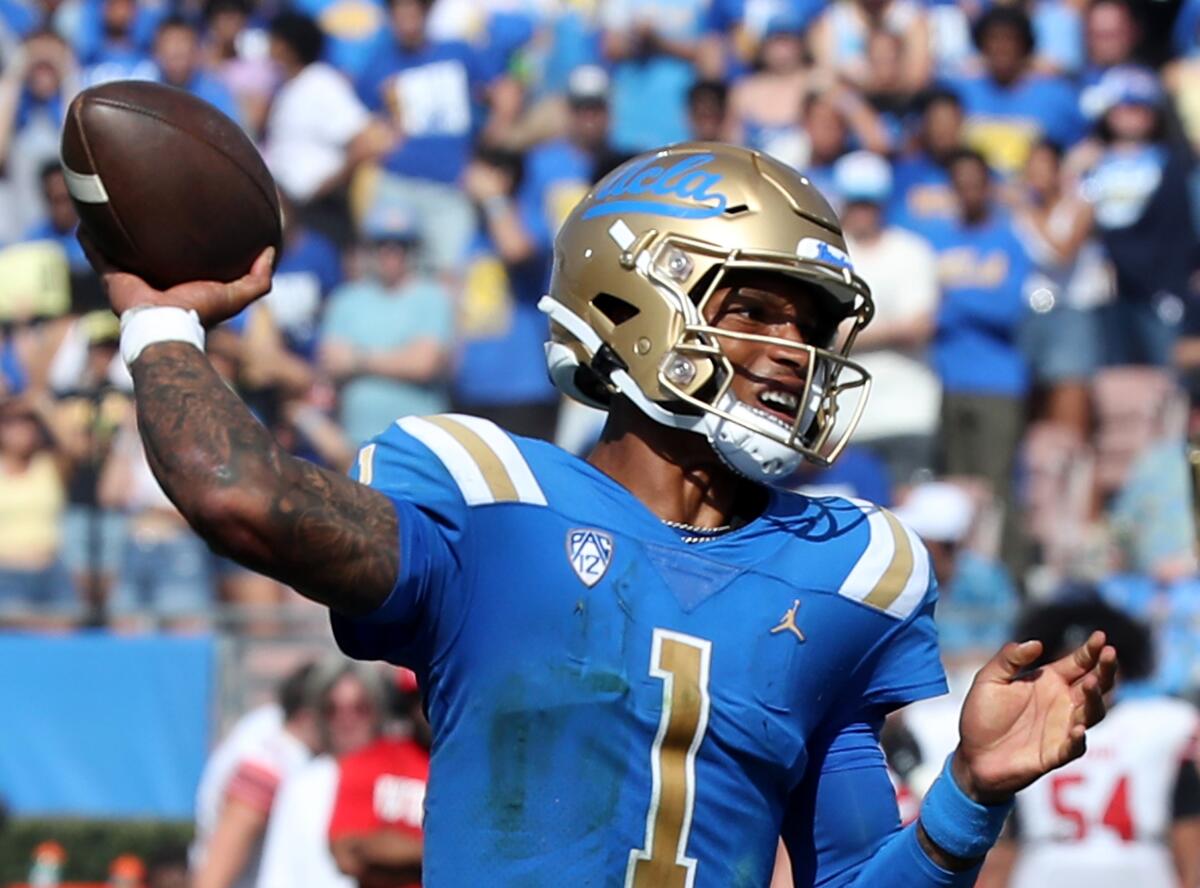 UCLA quarterback Dorian Thompson-Robinson throws downfield.