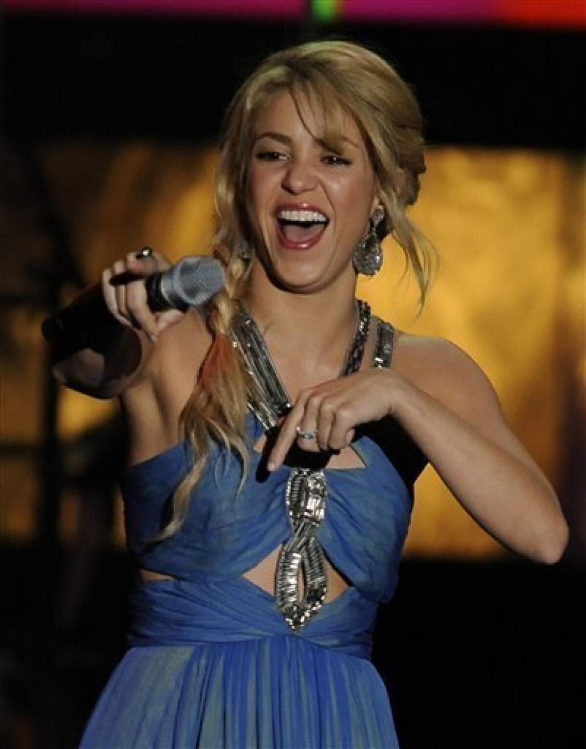 Shakira performs at the Latin Recording Academy Person of the Year tribute in her honor on Wednesday Nov. 9, 2011 in Las Vegas. (AP Photo/Chris Pizzello)