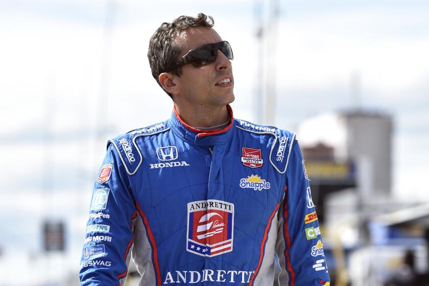 Justin Wilson of England died Monday after suffering a head injury during an IndyCar race Sunday at Pocono Raceway. He was 37.