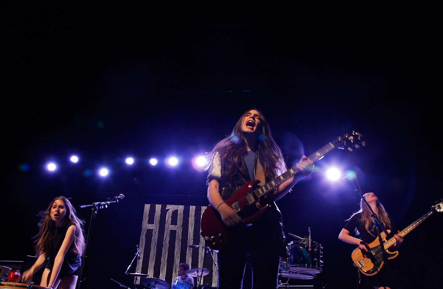 Haim, whose debut album "Days Are Gone" opened at No. 1 in the U.K. and No. 6 in the U.S., played a sold-out homecoming show at the Fonda Theatre in Los Angeles on Wednesday night. Alana, left, Danielle and Este Haim grew up in the Valley. The three sisters' band includes a mister, drummer Dash Hutton.