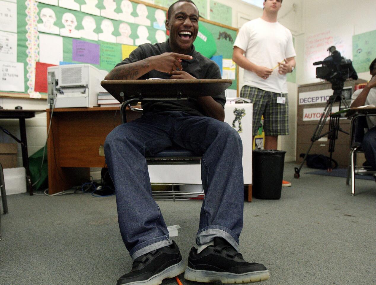 Marquis, 16, shares a light moment with other students at Camp Afflerbaugh, one of the two Los Angeles County juvenile probation camps to participate in the Freedom School program. The Times received permission from Los Angeles County juvenile court to use the images of the young men, as well as their first names.