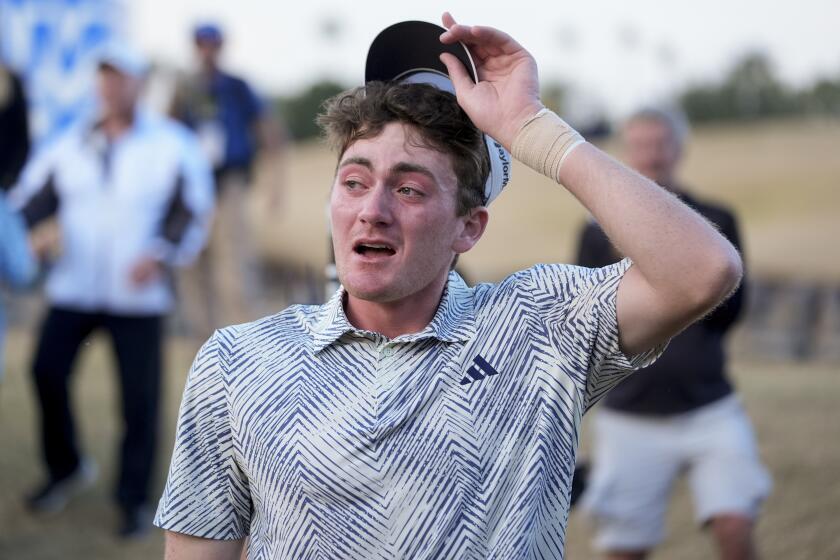 Nick Dunlap reacts after finishing on the 18th hole of the Pete Dye Stadium Course.