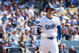 LOS ANGELES, CALIFORNIA - OCTOBER 14: Shohei Ohtani #17 of the Los Angeles Dodgers reacts.