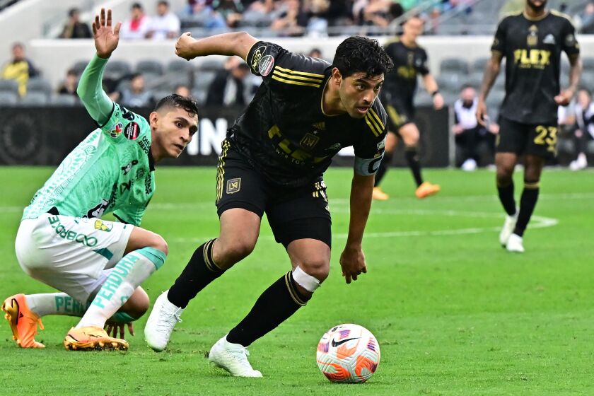 LAFC's Spanish-Mexican forward Carlos Vela vies for the ball with Leon's Mexican midfielder Fidel Ambriz.