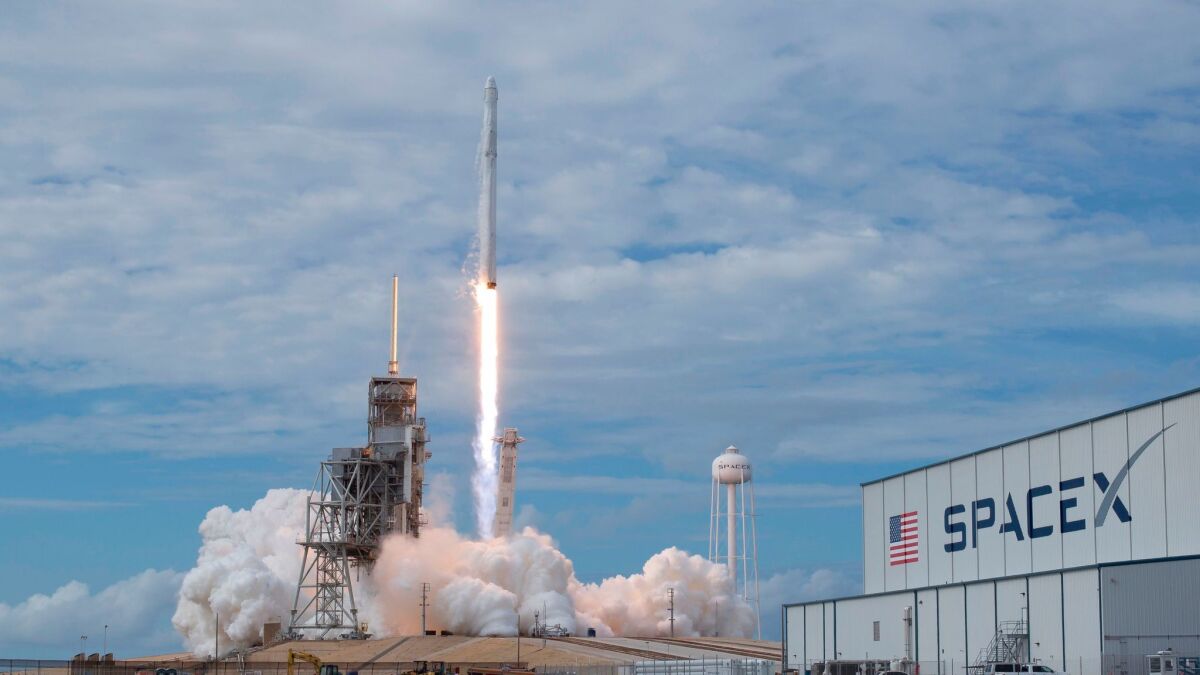 SpaceX's Falcon 9 rocket, with the Dragon spacecraft onboard, launches from pad 39A at Kennedy Space Center in Cape Canaveral, Florida, on June 3.