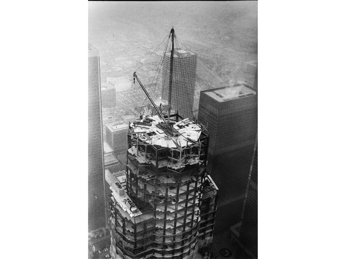 the top floors of a skyscraper under construction