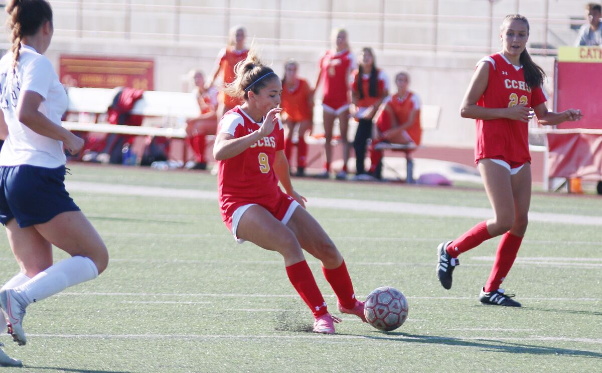 Cathedral Catholic's Claire Curran (9) unleashes the shot that resulted in the game's first goal.