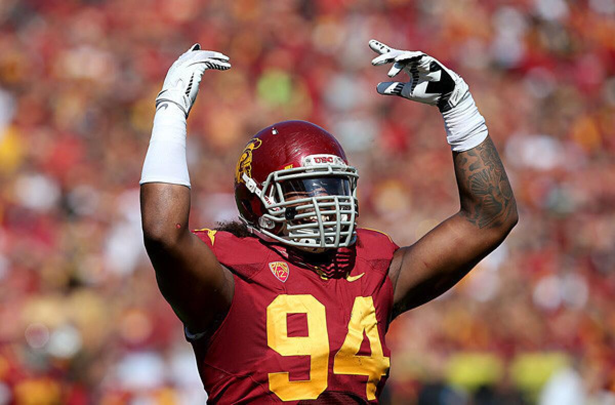 Trojans defensive end Leonard Williams (94) will be a cornerstone to build upon for incoming defensive line coach Chris Wilson.
