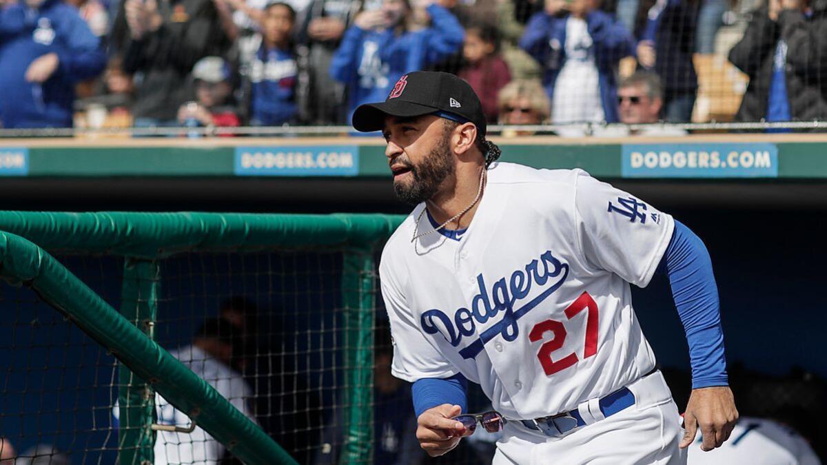 Dodgers left fielder Matt Kemp runs on to the field during pregame introductions at a Cactus League opening game against the Chicago White Sox at Camelback Ranch Stadium.