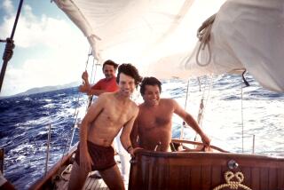 Sailing with Mick Jagger. Earl McGrath in the background. Mustique, 1985.