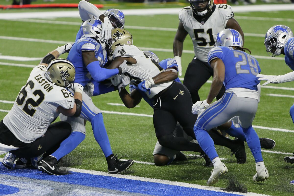 New Orleans Saints running back Latavius Murray rushes for a 6-yard touchdown during the second half of an NFL football game against the Detroit Lions, Sunday, Oct. 4, 2020, in Detroit. (AP Photo/Duane Burleson)