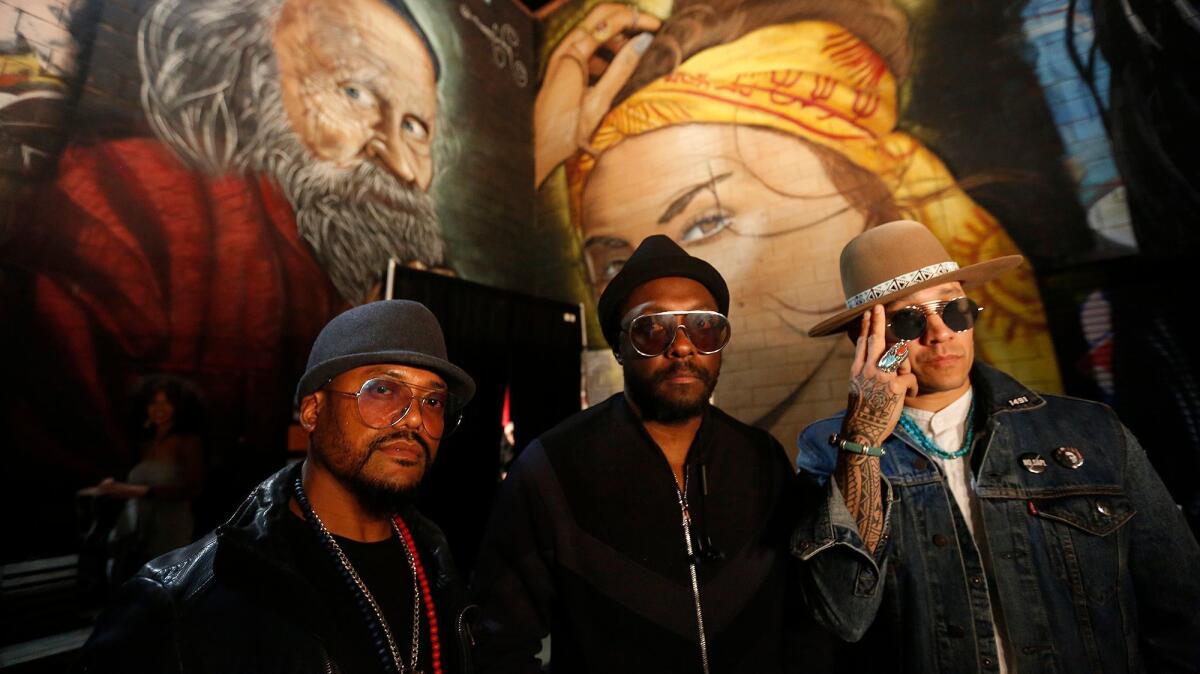 Apl.de.ap, from left, will.i.am and Taboo, of the Black Eyed Peas, are back with a new politically focused sound.