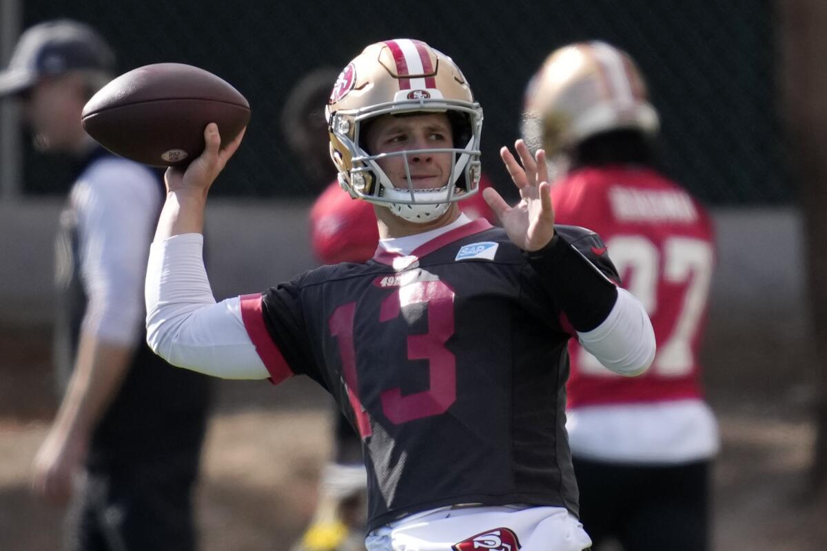 San Francisco 49ers quarterback Brock Purdy throws in practice Wednesday.