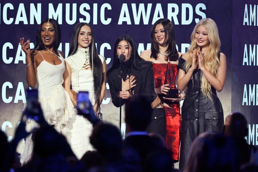 LAS VEGAS, NEVADA - MAY 25: (EDITORIAL USE ONLY) (L-R) Lara Raj, Daniela Avanzini, Sophia Laforteza, Megan Skiendiel and Yoonchae Jeung of Katseye accept the New Artist of the Year award onstage during the 52nd American Music Awards at MGM Grand Garden Arena on May 25, 2026 in Las Vegas, Nevada. (Photo by Ethan Miller/Getty Images)