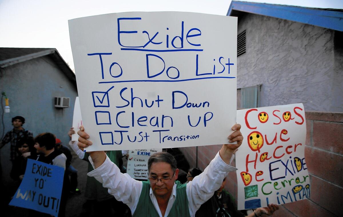 Community members and activists gather in a backyard of a home east of downtown Los Angeles to celebrate the closure of the Exide Technologies battery recycling plant on March 12.