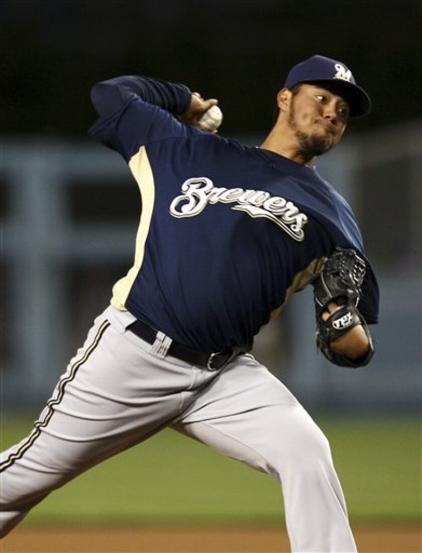 Milwaukee Brewers pitcher Yovani Gallardo throws against the Los Angeles Dodgers during the first inning of an exhibition baseball game, Friday, April 3, 2009, in Los Angeles. (AP Photo/Jeff Lewis)