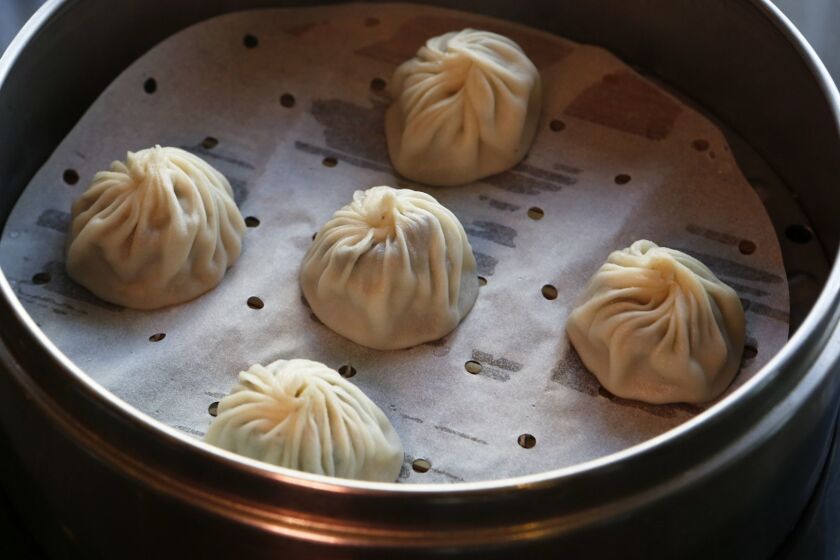GLENDALE, CA. - DECEMBER 16, 2013: Truffle dumplings for Jonathan Gold food review of Din Tai Fung in the Americana Mall in Glendale on December 16, 2013. (Anne Cusack/Los Angeles Times)