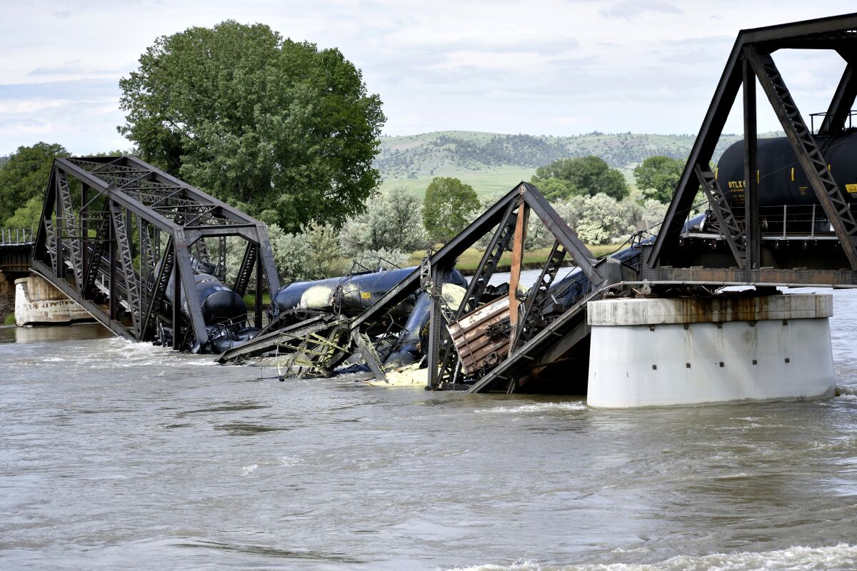 Work begins to clean up train derailment in montana's yellowstone river -  the san diego union-tribune