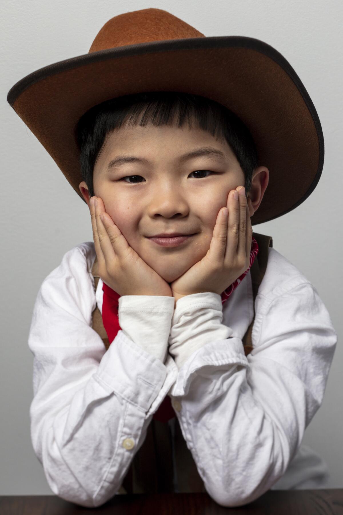 Child in a cowboy hat