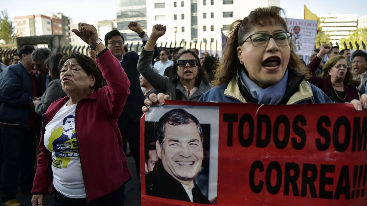 Supporters of Ecuadorean former President Rafael Correa, shout slogans while demonstrating outside the National Court in Quito, on November 07, 2018, as a judge decides if Correa will be tried for allegedly kidnapping an opponent in 2012.