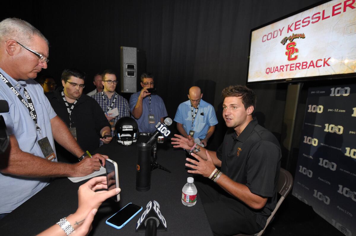 USC quarterback Cody Kessler speaks to reporters during Pac-12 Conference football media day at Warner Bros. Studios in Burbank.