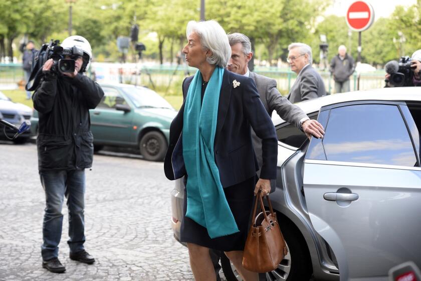 Christine Lagarde, the head of the International Monetary Fund and former French finance minister, arrives at a Paris court for questioning by a judge in a case involving a $366-million payout to a businessman and supporter of former French President Nicolas Sarkozy.