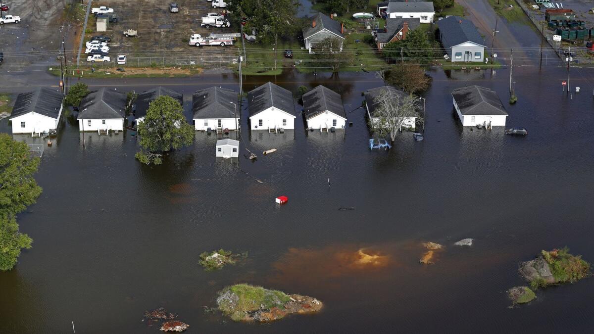 Floodwaters from Hurricane Florence surround homes in Dillon, S.C.