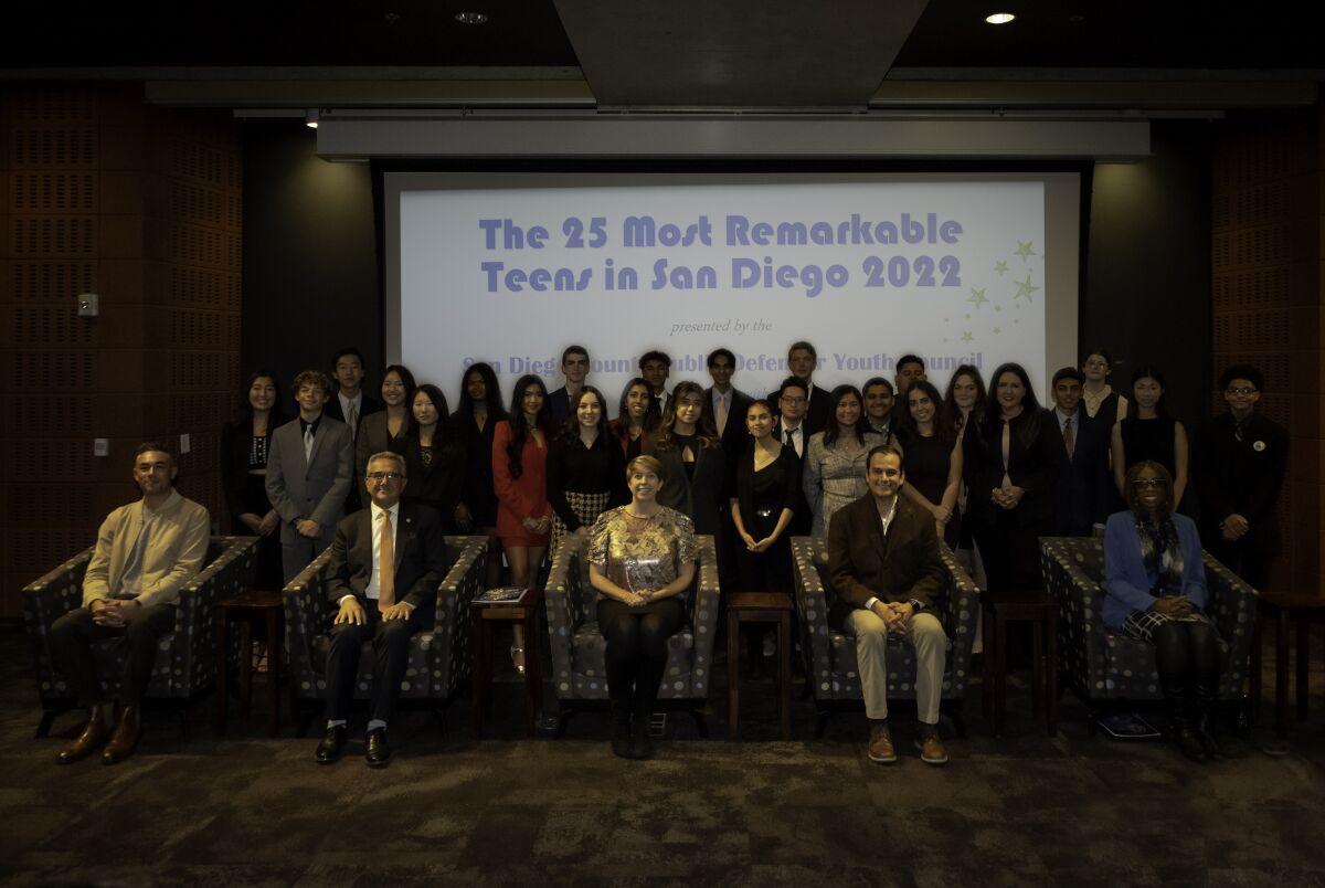 San Diego County’s “25 Most Remarkable Teens” for 2022 pose with city and county leaders at the San Diego Central Library