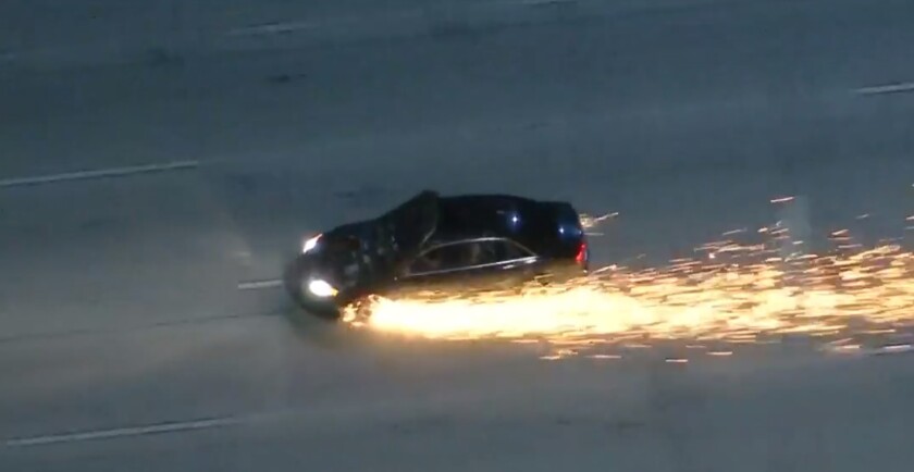 A wild pursuit Thursday night sent sparks flying on the freeway.
