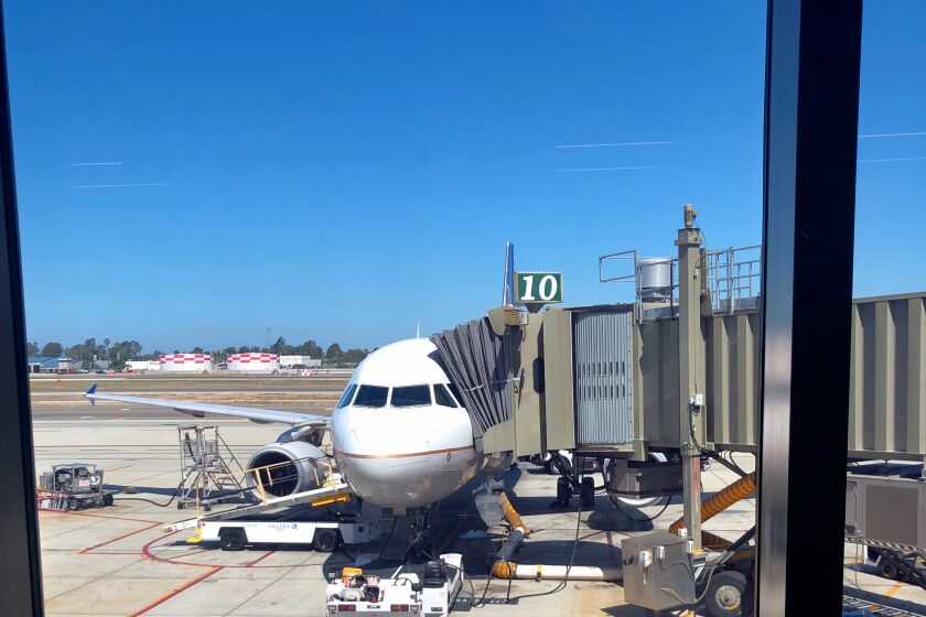 United Airlines at JWA on Tuesday prepares to board a full flight to Denver on time.