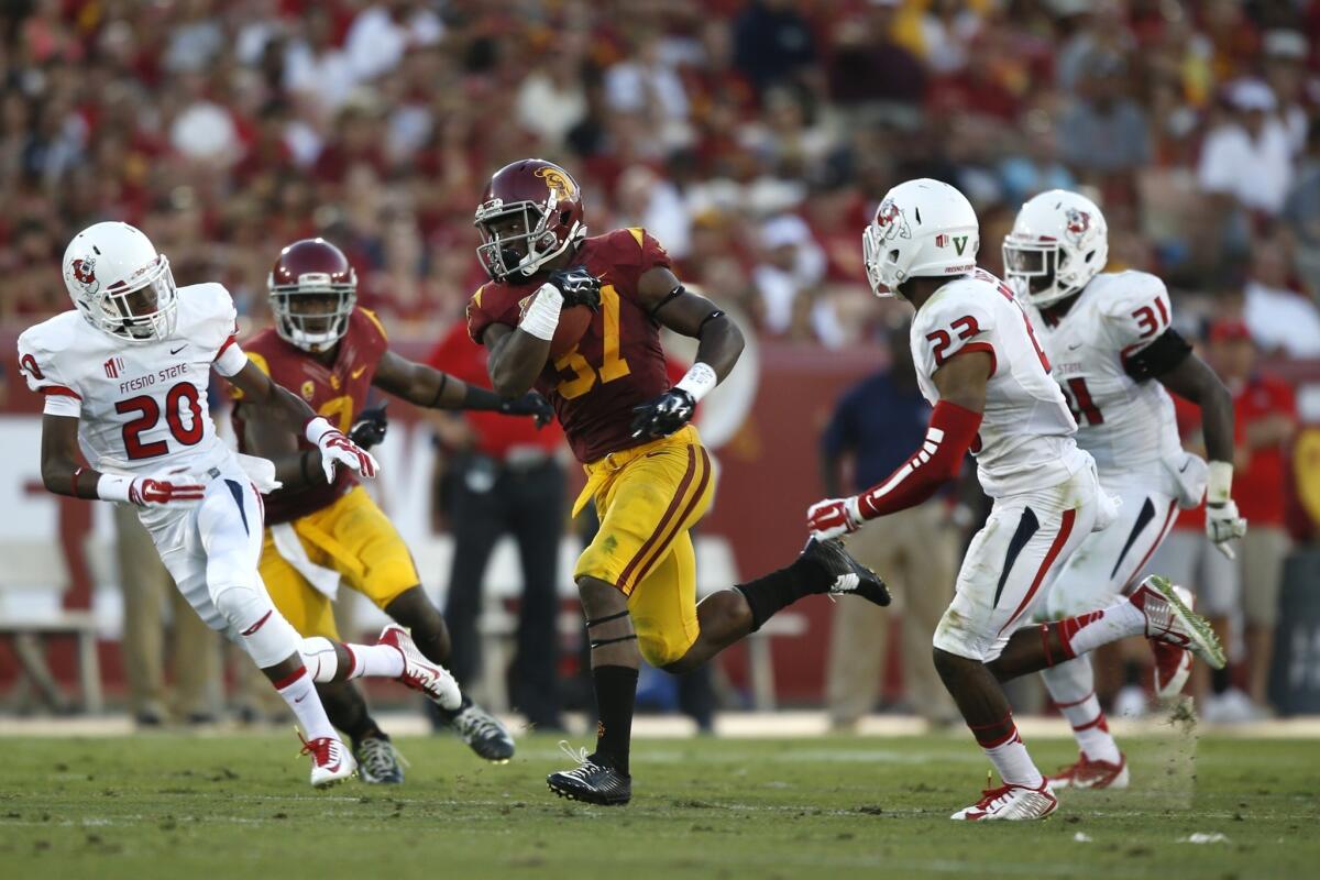 USC running back Javorius Allen breaks into the Fresno State secondary for a big gain in the third quarter.