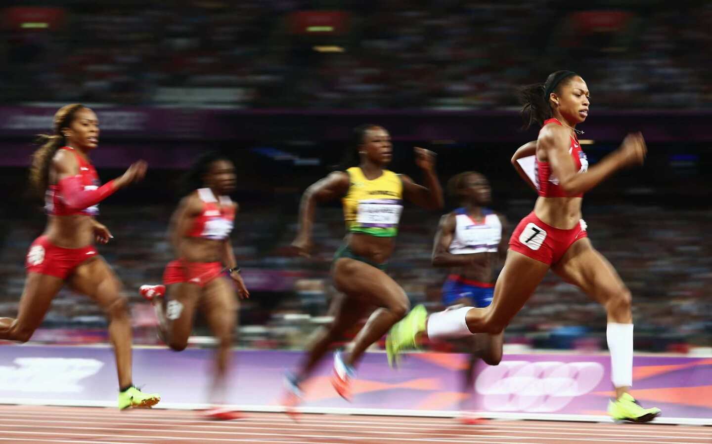 Allyson Felix of the United States leads the field in the women's 200 meters at the London 2012 Olympics. She'd won silver at Beijing and Atlanta in the event.