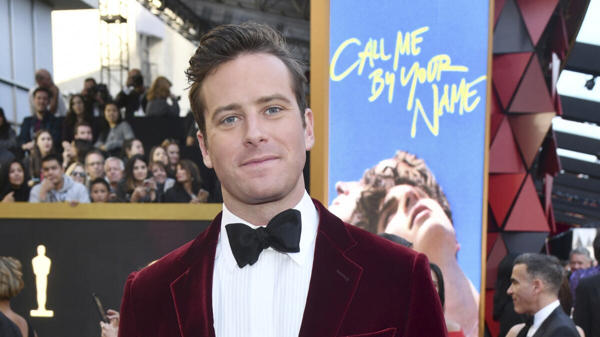 Armie Hammer cut loose with a hot dog cannon during the Academy Awards ceremony.