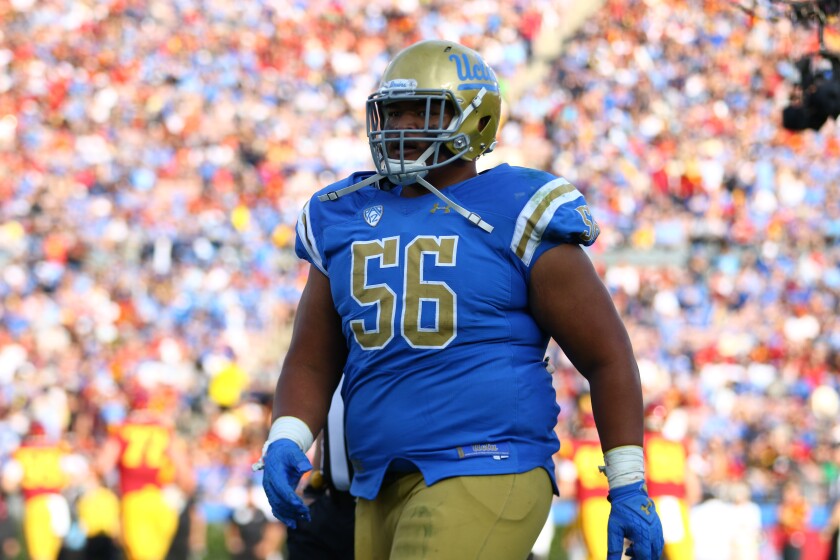 UCLA offensive lineman Atonio Mafi plays against USC in November 2018.