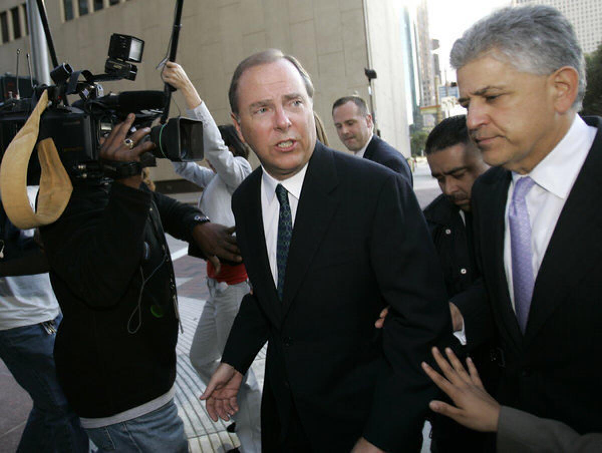 Former Enron CEO Jeff Skilling, left, wants an early release from his 24-year prison sentence.