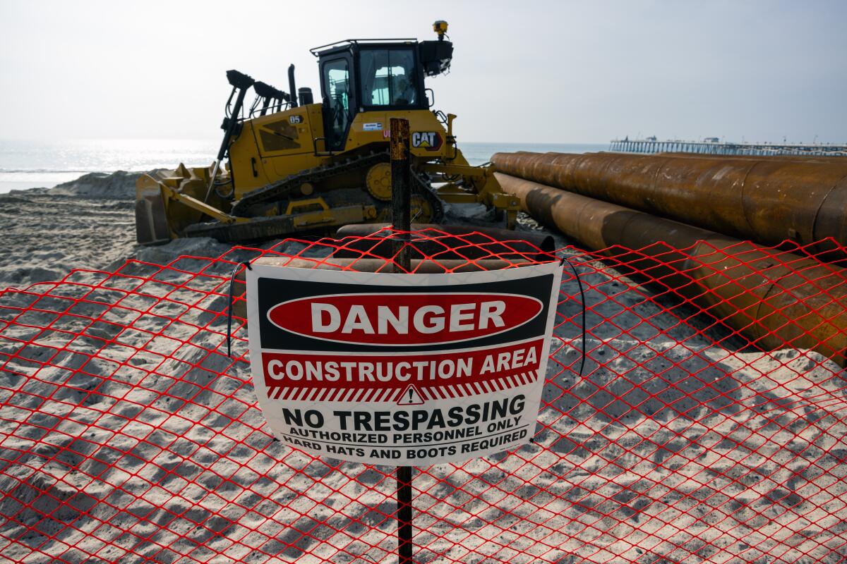 A sign warns away trespassers from a sand-restoration project in San Clemente in December.