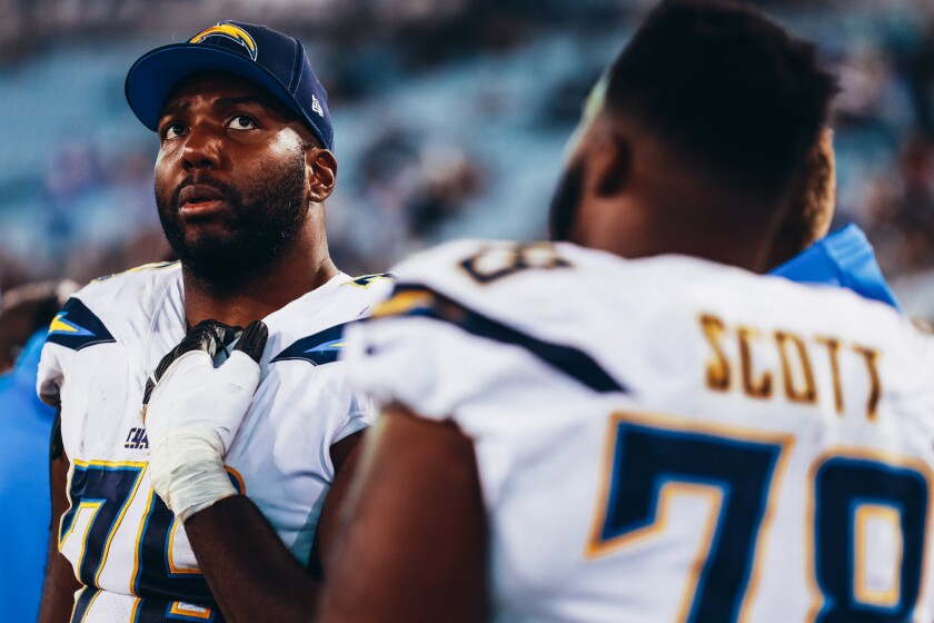 The Chargers traded veteran offensive tackle Russell Okung to the Carolina Panthers on Wednesday.