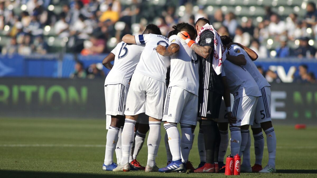The Galaxy huddle before the start of a game against Real Salt Lake at Dignity Health Sports Park on April 28 in Carson.