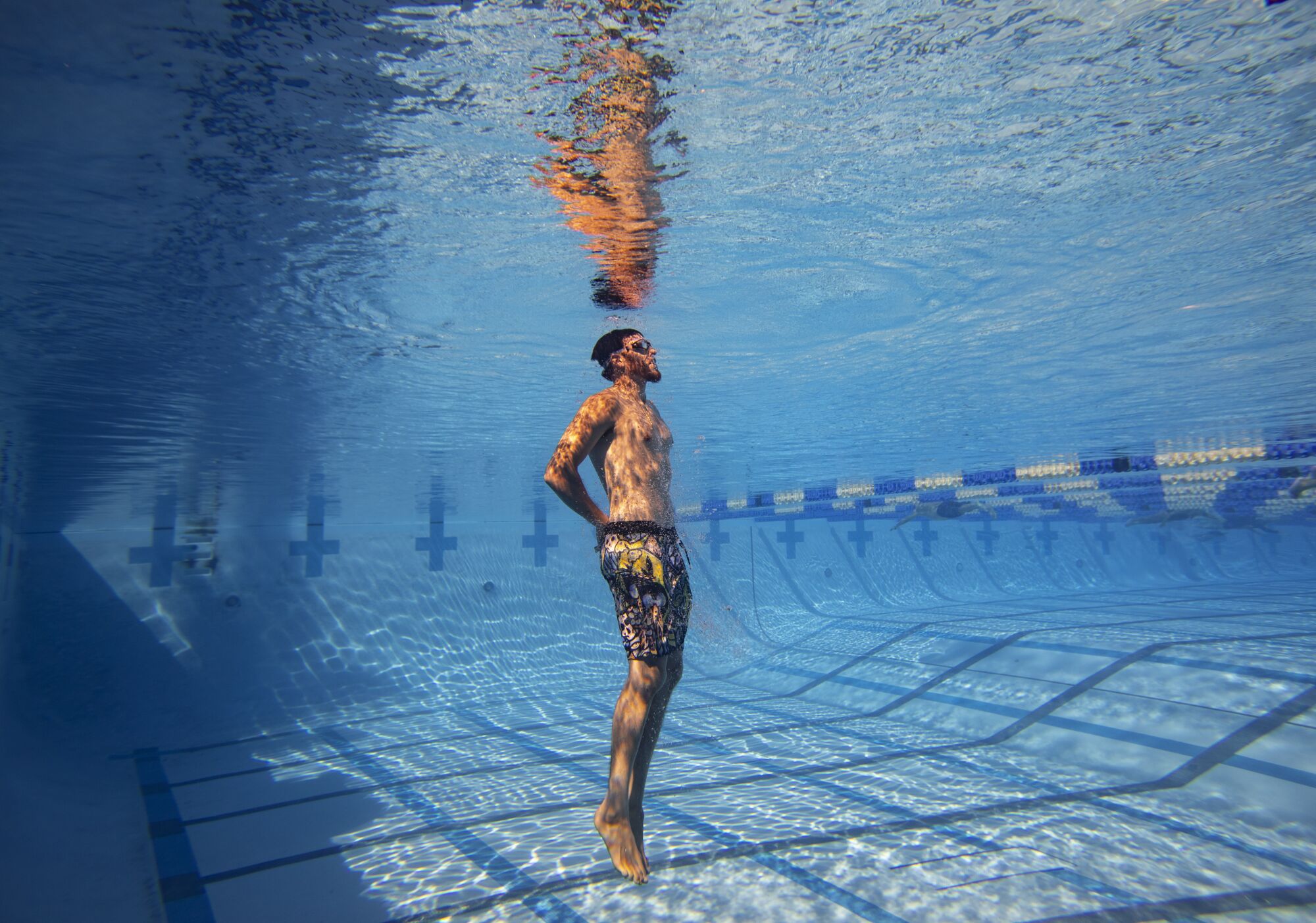 Joe Musgrove does breath holding drills in a pool on January.