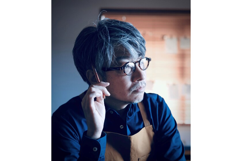 Kentaro Kobayashi looking into the distance.