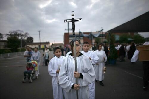 Worshipers assemble in the parking lot of St. Patrick's Church on Central Avenue for a Corpus Christi procession. Last year, St. Patrick's built a new sanctuary to house the growing Latino community in South Los Angeles.